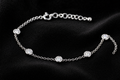 Moissanite Bezel Station Bracelet on black velvet