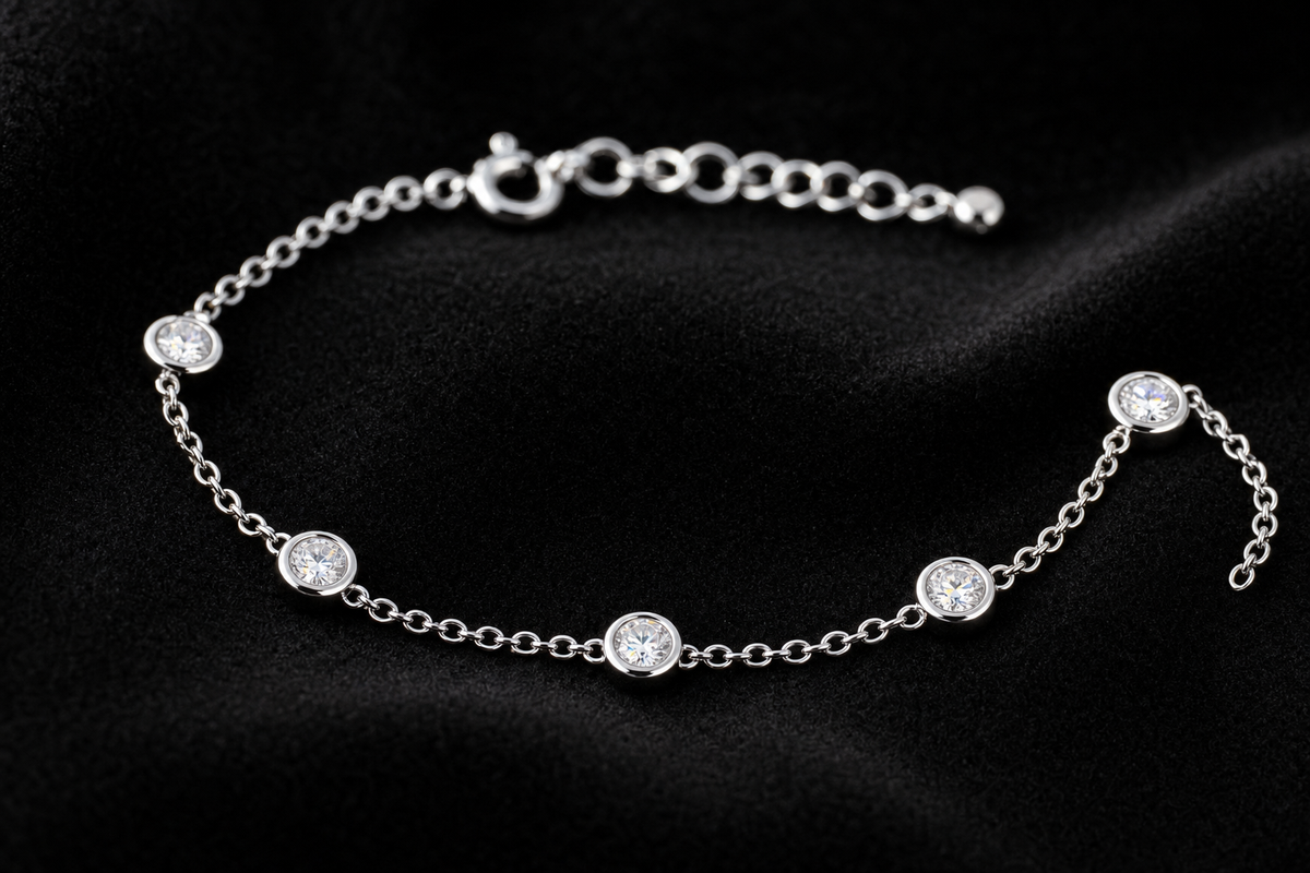 Moissanite Bezel Station Bracelet on black velvet
