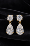 Pear Moissanite Drop Earrings on black velvet