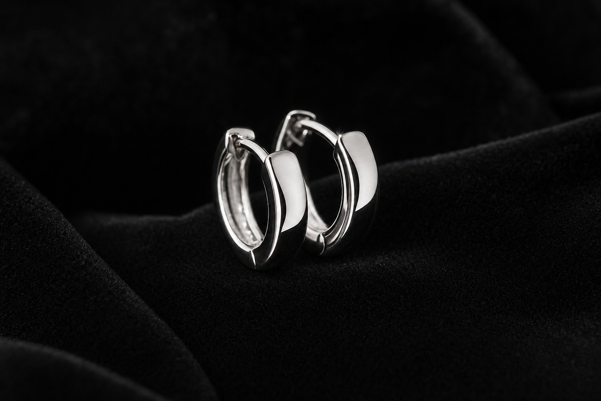 Polished Huggie Hoop Earrings on black velvet