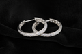Moissanite Inside-Out Hoop Earrings on black velvet