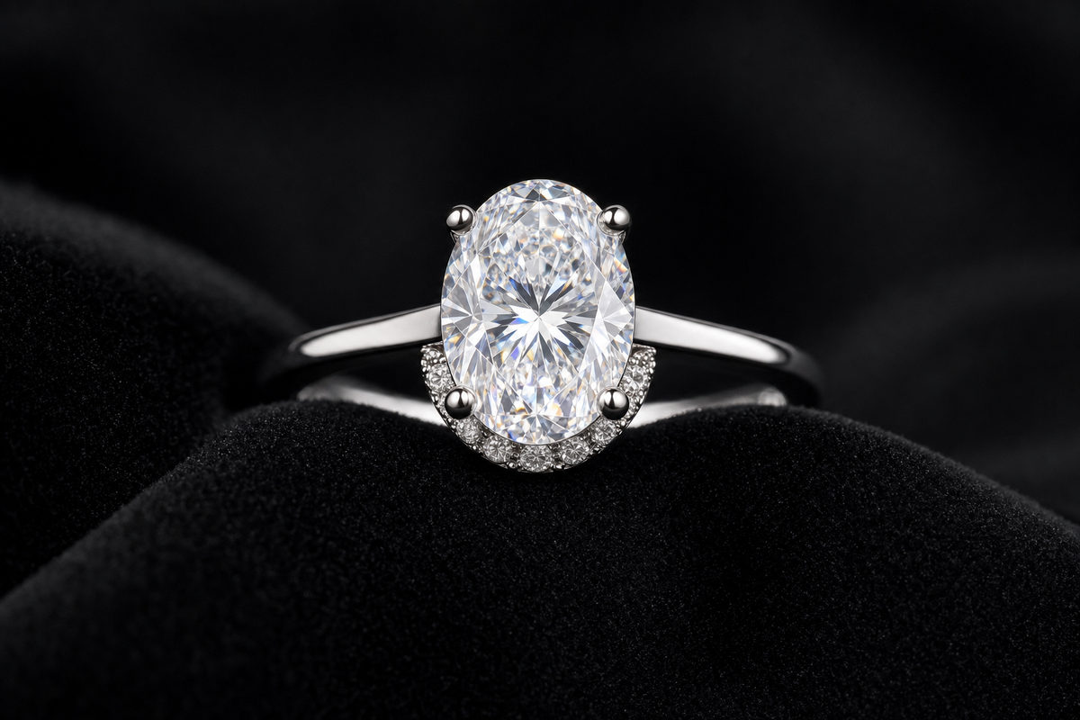 Oval Moissanite Hidden Halo Ring on black velvet