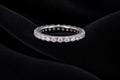 Moissanite Pavé Eternity Band on black velvet