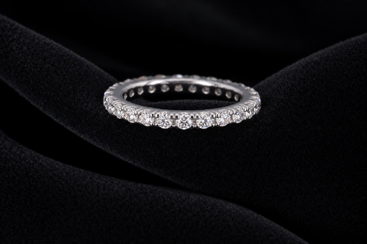 Moissanite Pavé Eternity Band on black velvet
