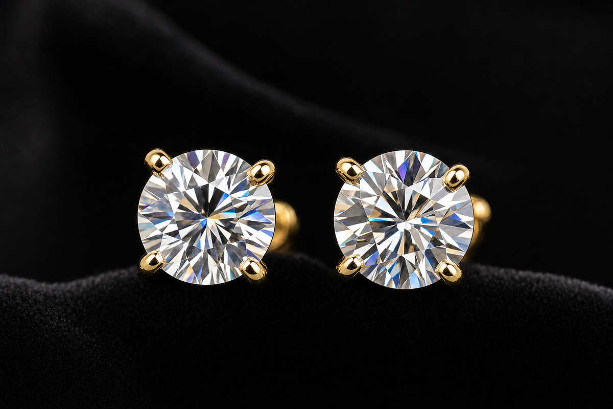 Round Moissanite Stud Earrings on black velvet